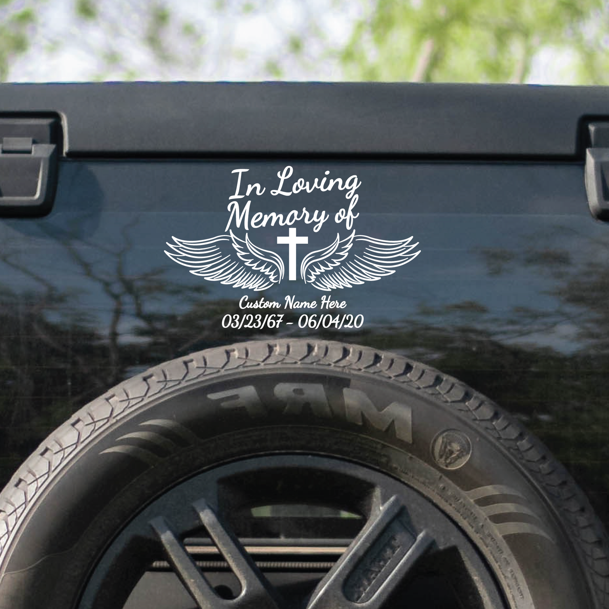 Rear of a jeep showcasing a " In Loving Memory" decal that was personalized.