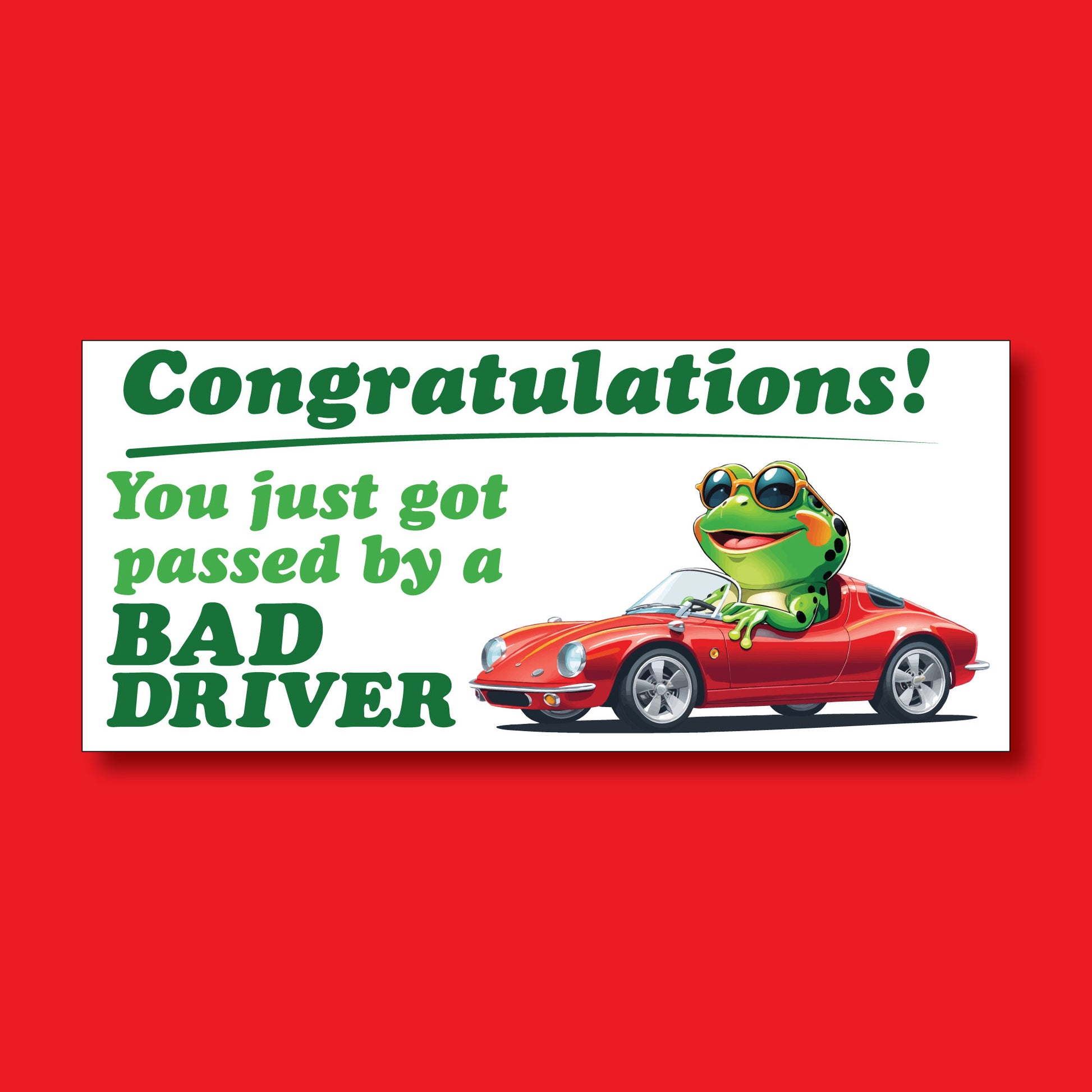 This showcases a frog in a red car with text to the left of it saying, "Congratulations! You just got passed by a BAD DRIVER".
