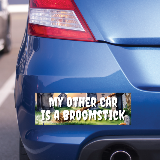 Blue car with a Halloween-themed bumper sticker on the back